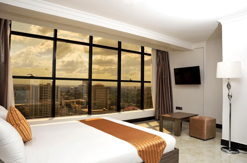 Golden Tulip Dar Es Salaam City Center Hotel Room photo